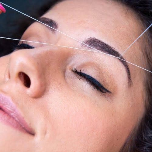 Threading,waxing eyebrows